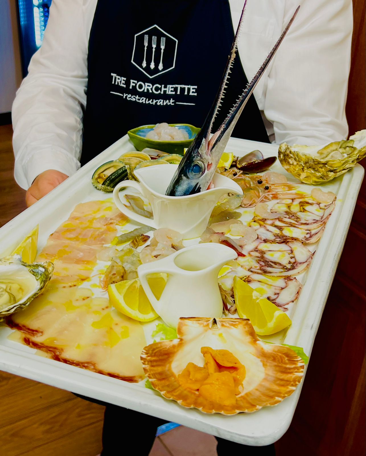 Exquisite seafood spectacular with various delicacies at TRE FORCHETTE